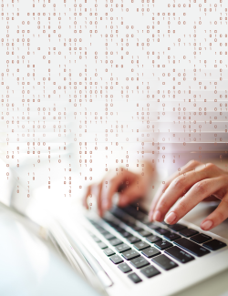 Repeated binary code raining over hands typing on a keyboard